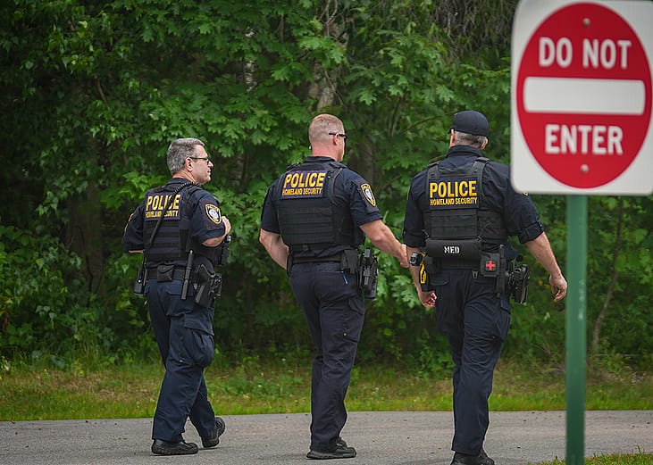 Department of Homeland Security (DHS) officers are seen outside of a federal immigration office after a man was fatally shot by U.S. Immigration and Customs Enforcement (ICE) agents, on July 14, 2026 in Scarborough, Maine.