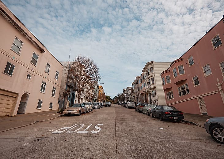 View of a steep residential street in San Francisco, California.