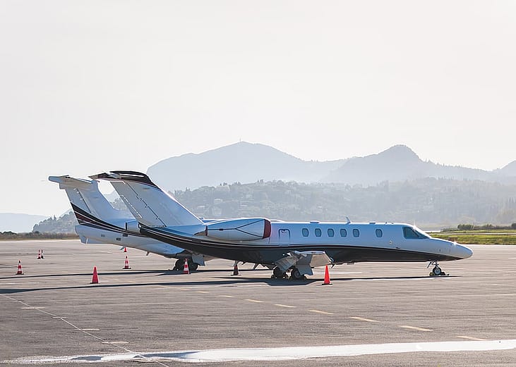 View of modern private reactive aircraft on an runway airfield ready to take off.