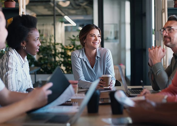A business core team discussing and planning for their new startup in an office.