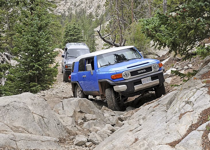 A 4x4 vehicle driving through the roughest Four Wheel Drive roads in the country, the Lake Como Road, in the Sangre de Cristo Mountains in Alamosa, Colorado, USA.