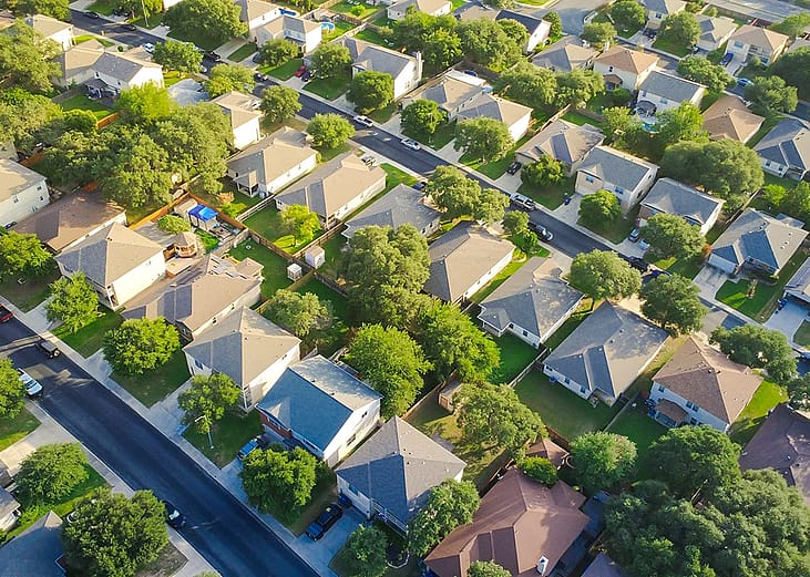 An aerial view of single suburban house driveways in San Antonio, Bexar County, Texas, USA.