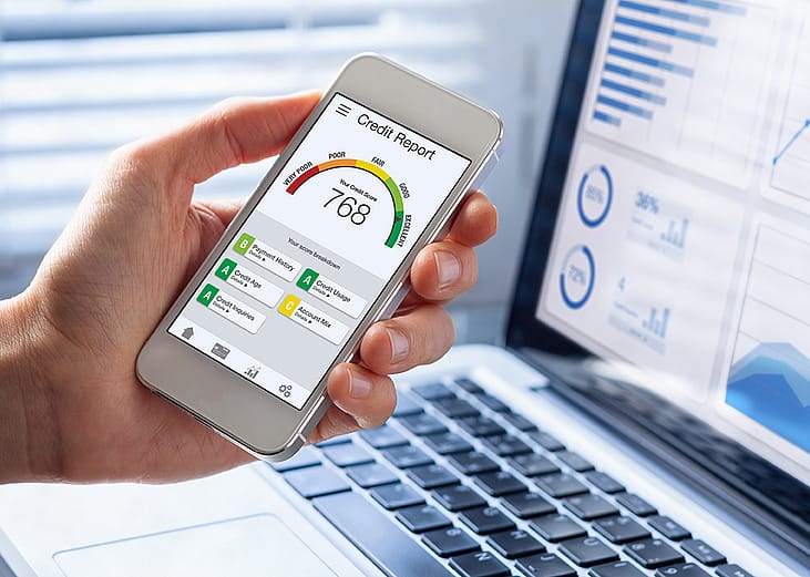 A Credit Report with Score rating app displayed on a smartphone's screen for a person's creditworthiness for loan and mortgage application.