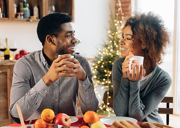 A married couple bonding over coffee and conversations before the holidays.