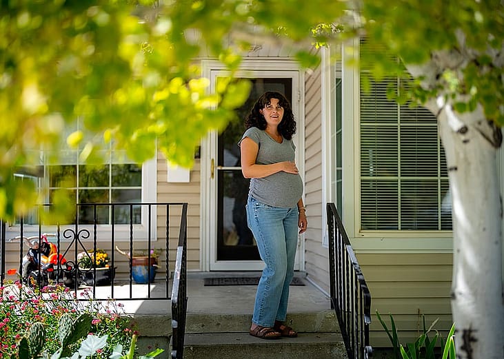 Kelsey Brown in Millcreek on Friday, Sept. 11, 2026. She and her husband aren't sure when they’ll be able to afford to move on from the home they bought five years ago — and are now outgrowing.