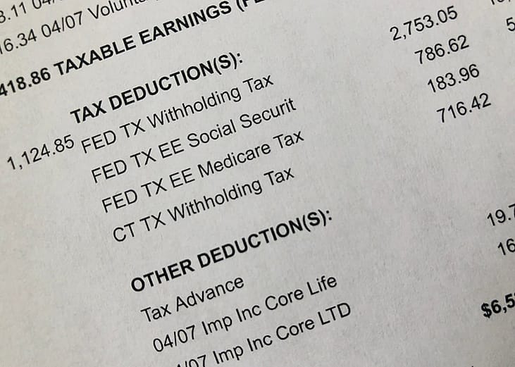 A payment stub showing tax deduction category and its details.
