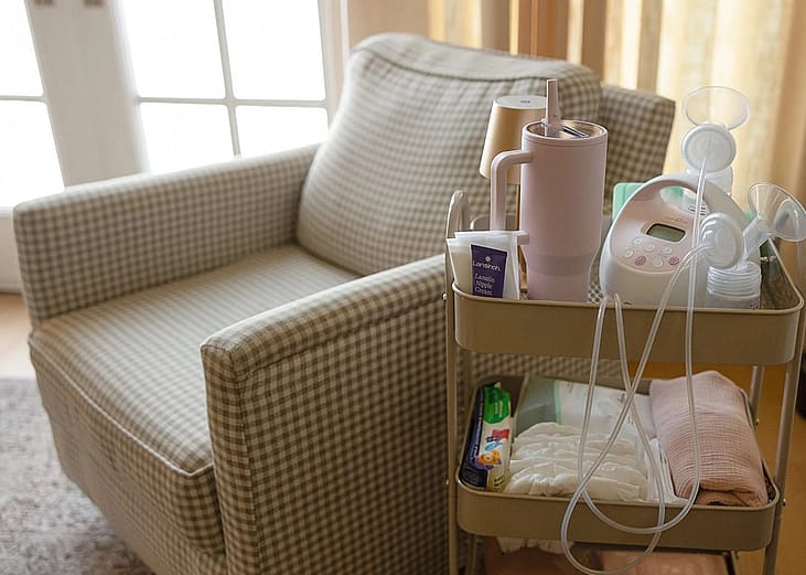 A pillowback chair with a nursery cart