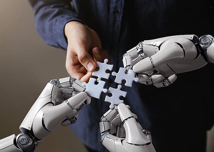 A conceptual image of a human and robot working together to solve a puzzle.