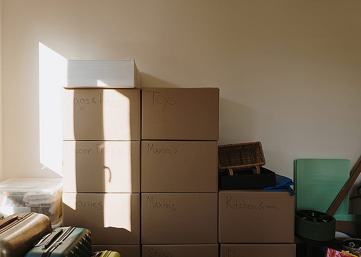 Labeled cardboard boxes for storage.