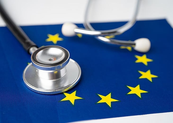 A stethoscope on top of an EU flag.