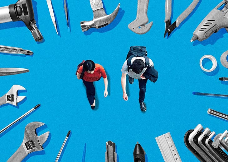 Students navigating career paths surrounded by various tools and trade equipment.