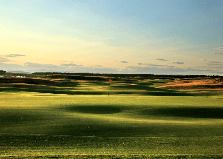A green hilly golf course.