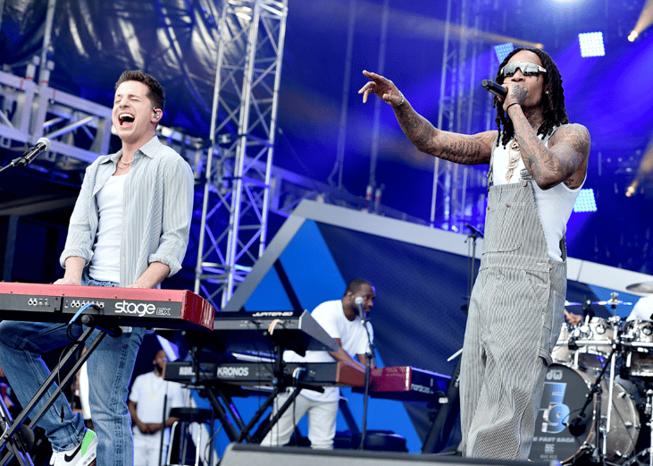 Wiz Khalifa and Charlie Puth performing.