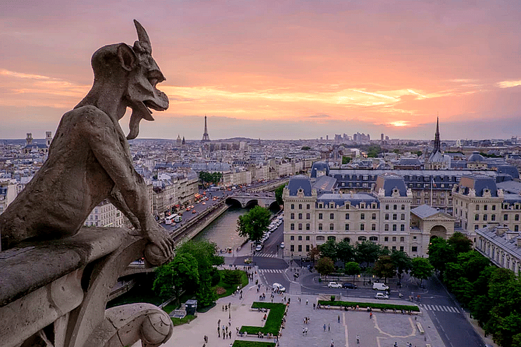 Gargoyle watching from atop Notre Dame