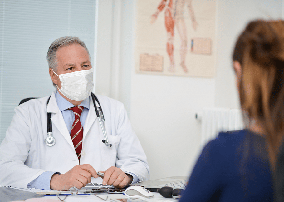 Unvaccinated workers at some companies face a hike in health insurance costs