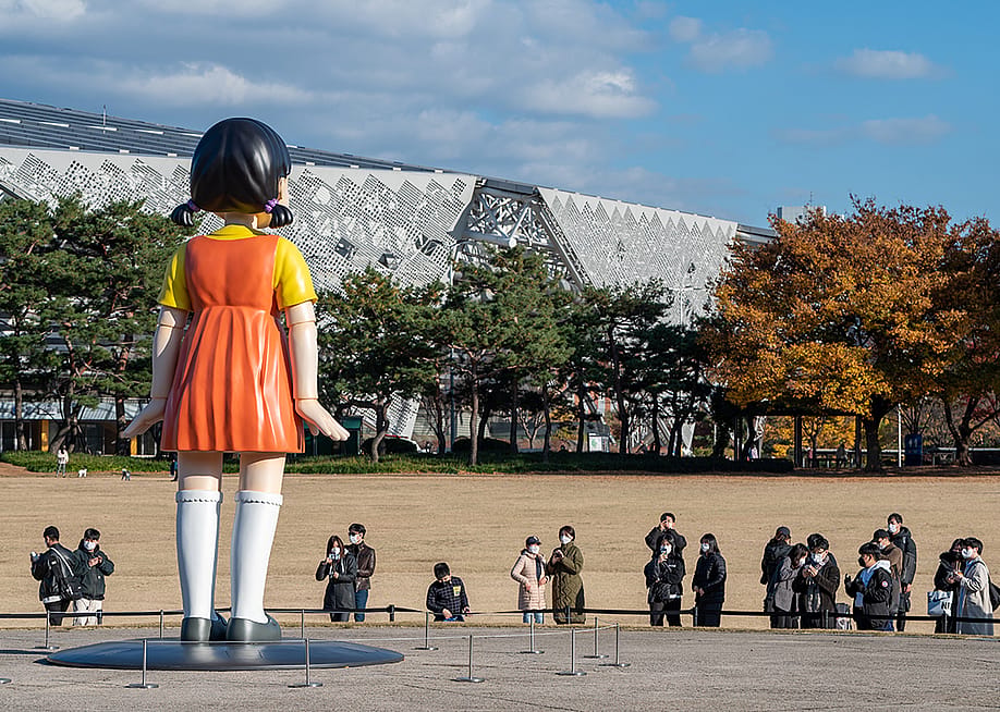 A view of the Seoul Olympic Stadium from the Olympic Park in South Korea and where tourists flock to photograph the giant "Yeonghee" doll from Squid Games. — Ju Jae-young // Shutterstock