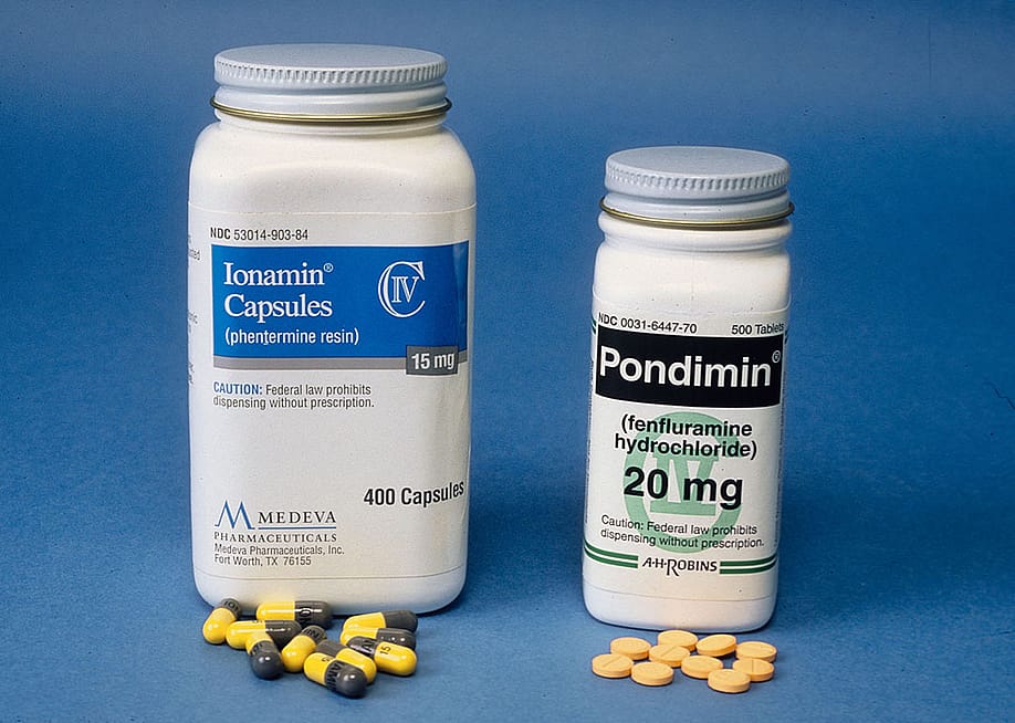 Bottles of Phentermine (L) and Fenfluramine, commonly known as Phen-Fen, a drug that has been discontinued seen here from April 1997. — Yvonne Hemsey // Getty Images