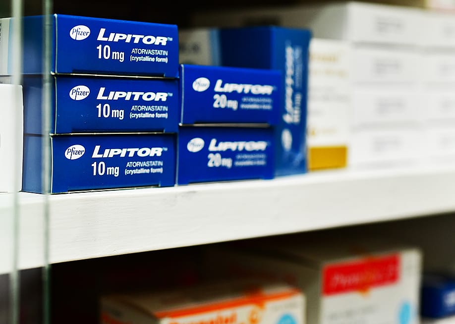 Boxes of Lipitor on a pharmacy shelf. — i viewfinder // Shutterstock