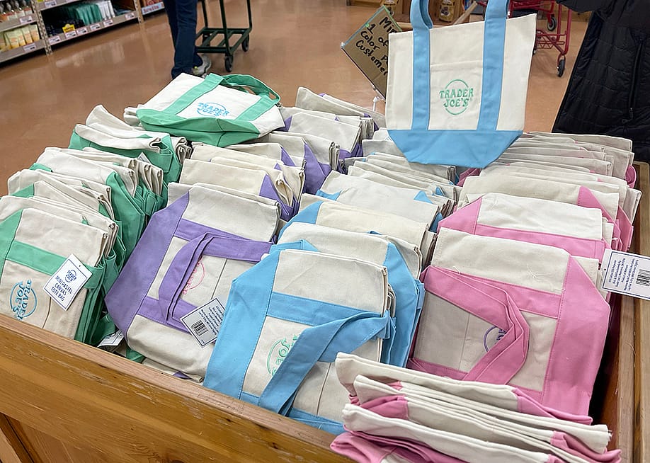 The viral Trader Joes mini pastel canvas tote bags for sale. — Josiah True // Shutterstock