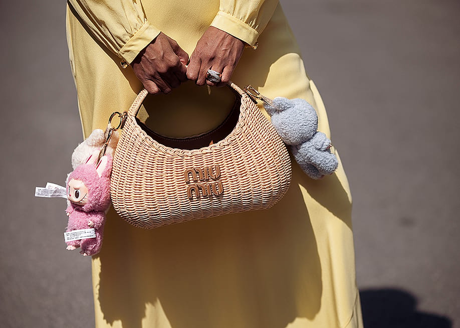 Zufi Alexander's straw Miu Miu bag attached with Labubu charms. — Raimonda Kulikauskiene // Getty Images