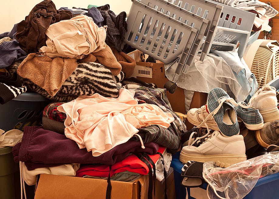Pile of miscellaneous items in a room. — MCarper // Shutterstock