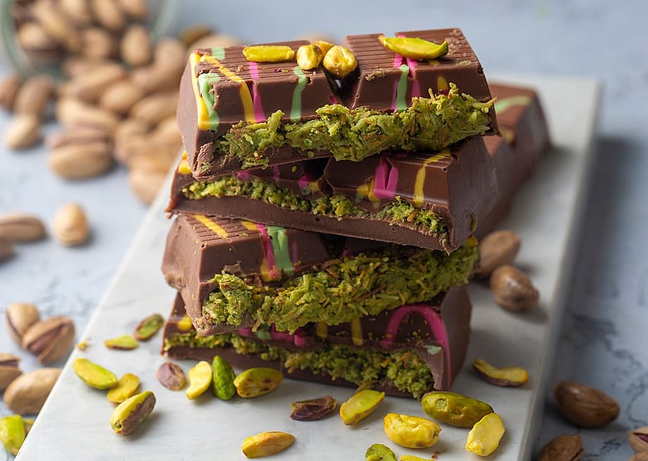 Bars of the trending Dubai chocolate with pistachio paste and kataifi dough. — Melody's Dreams // Shutterstock