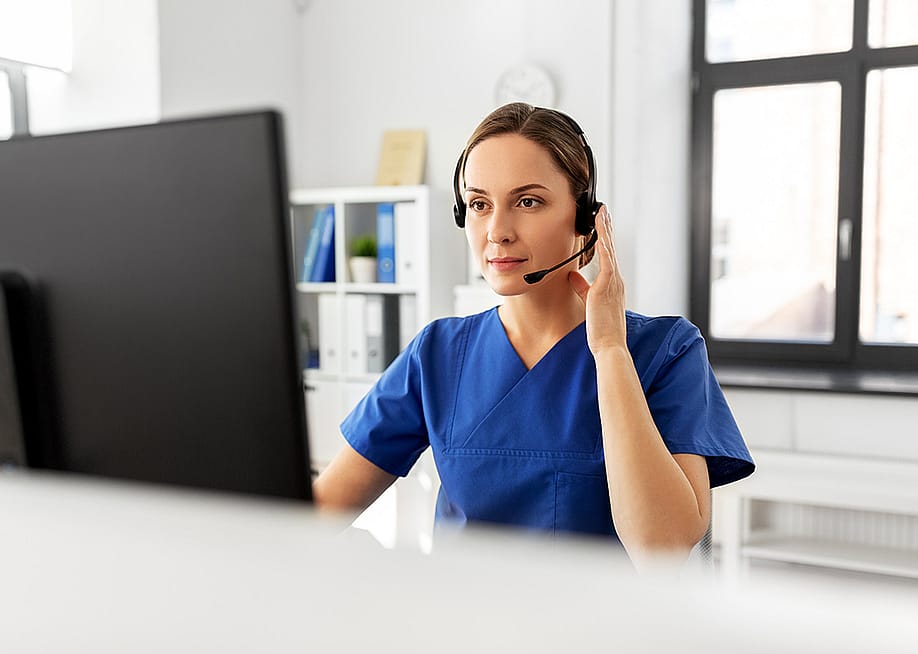A nurse on a virtual consultation. — Ground Picture // Shutterstock