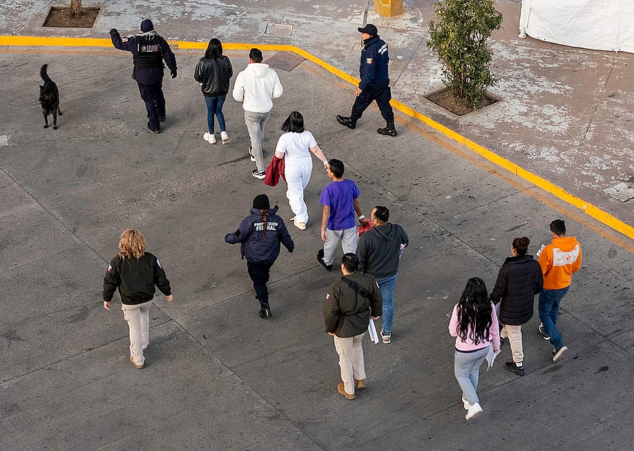 Aerial view of Mexican immigration officials and police escorting deportees in January 2025 from Nogales, Arizona — John Moore // Getty Images