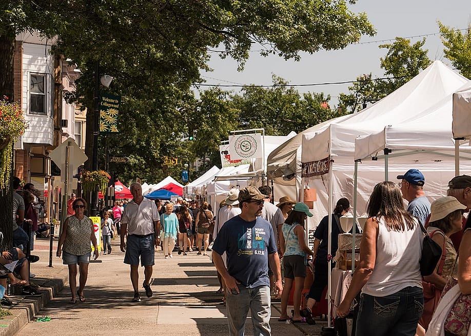 Customers and vendors at The Collingswood Craft and Fine Art Festival in New Jersey. — Alan Budman // Shutterstock