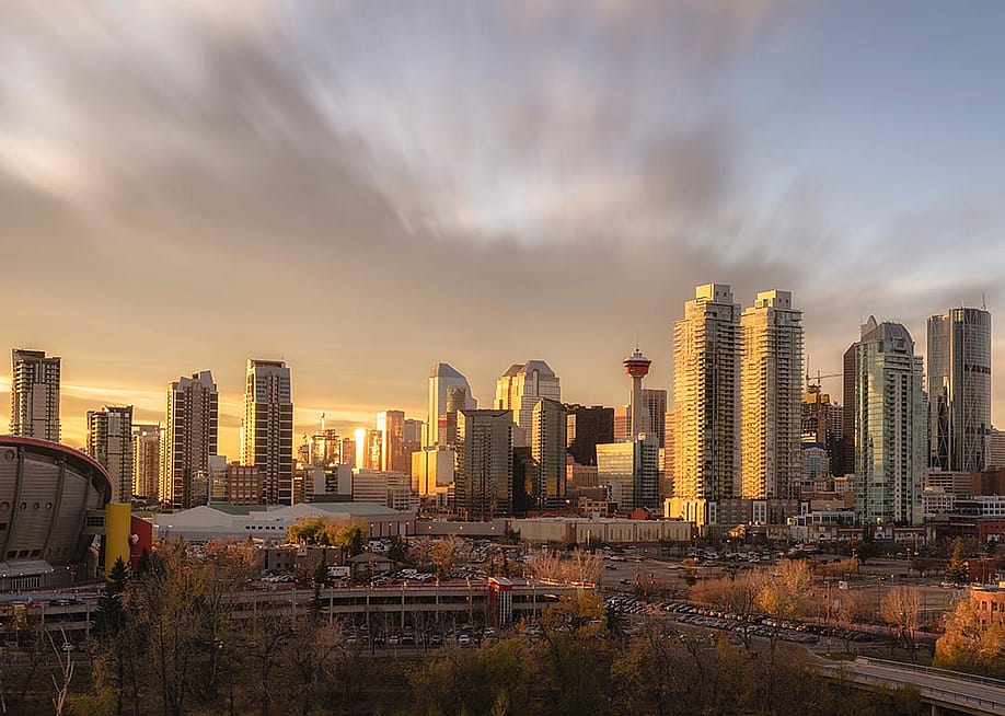 Skyline of Calgary during sunset with golden light reflecting off skyscrapers. — Robert Harding Video // Shutterstock