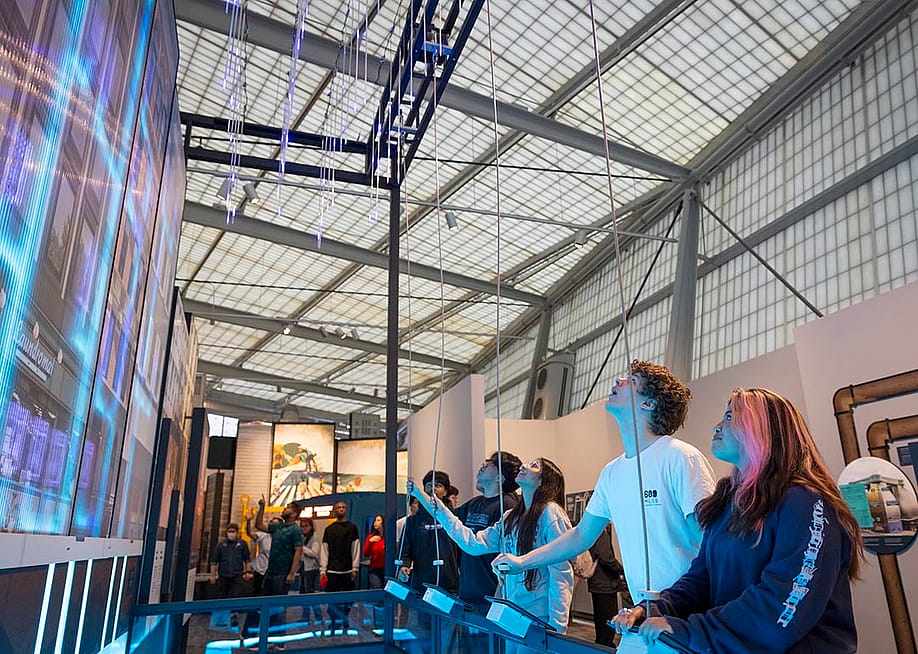 People interacting with a CityWorks exhibit exploring the water and wastewater infrastructure system. — Courtesy of New York Hall of Science