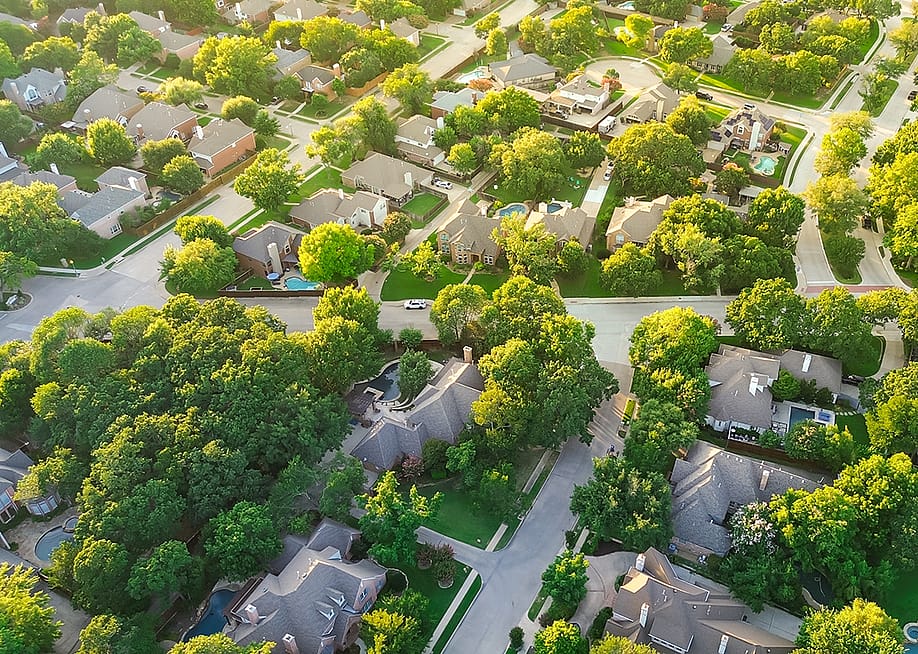 Aerial view of an upscale neighborhood in Dallas Fort Worth metroplex. — Trong Nguyen // Shutterstock
