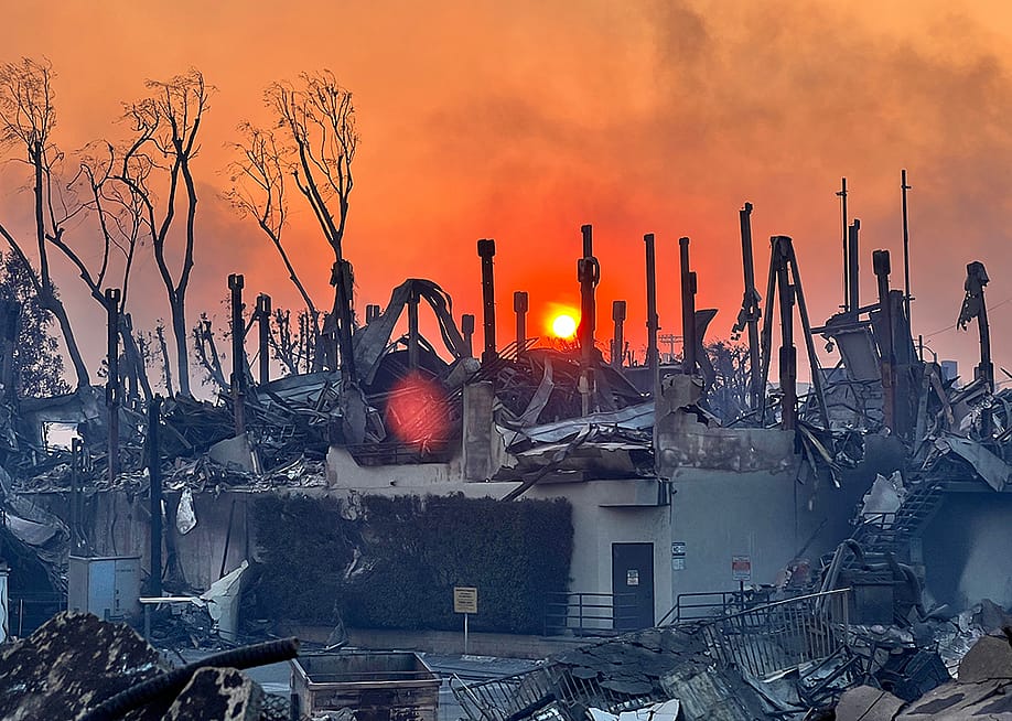 A luxury home reduced to charred pillars after the Palisades fires in Los Angeles, California. — Draco Guan // Shutterstock