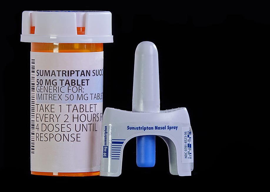 Sumatriptan tablets and nasal spray. — Simone Hogan // Shutterstock