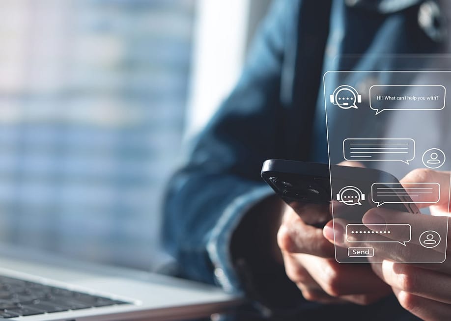 Person using online customer service with chatbot to get support. — TippaPatt // Shutterstock