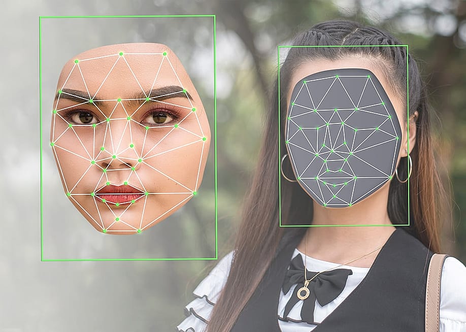 A woman's face cropped out and illustrated with a deepfake, matching facial movement graphics. — MDV Edwards // Shutterstock