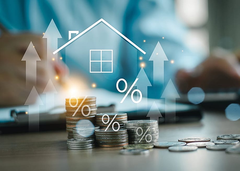 Home insurance and real estate protection concept graphics over stacks of coins. — earthphotostock // Shutterstock