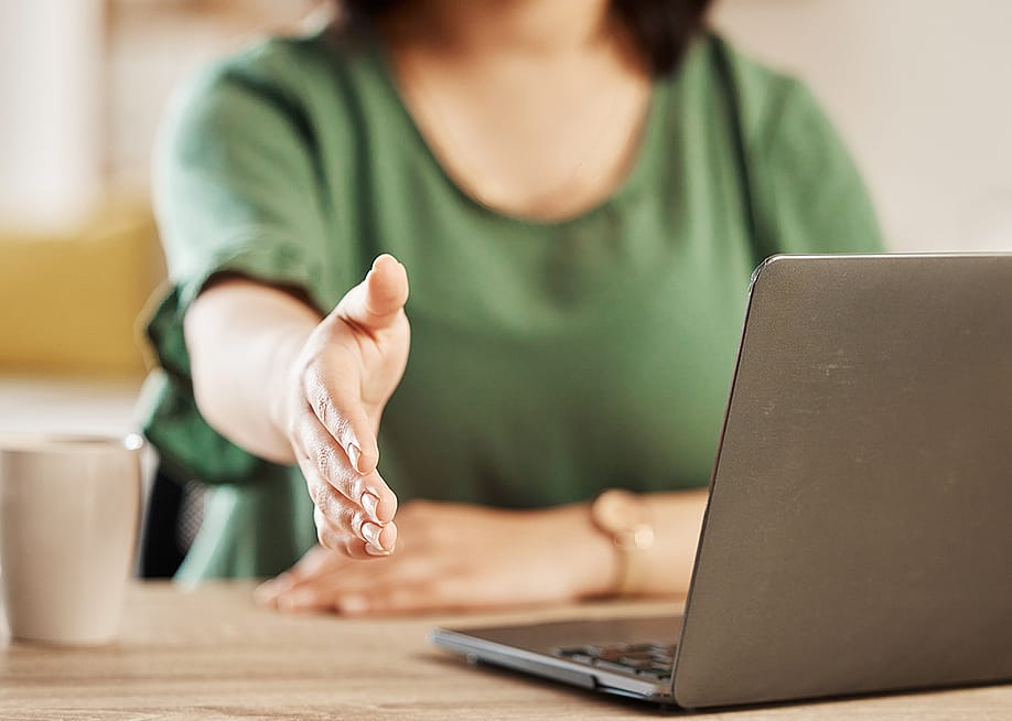 A woman extending her hand for a handshake. — PeopleImages.com - Yuri A // Shutterstock
