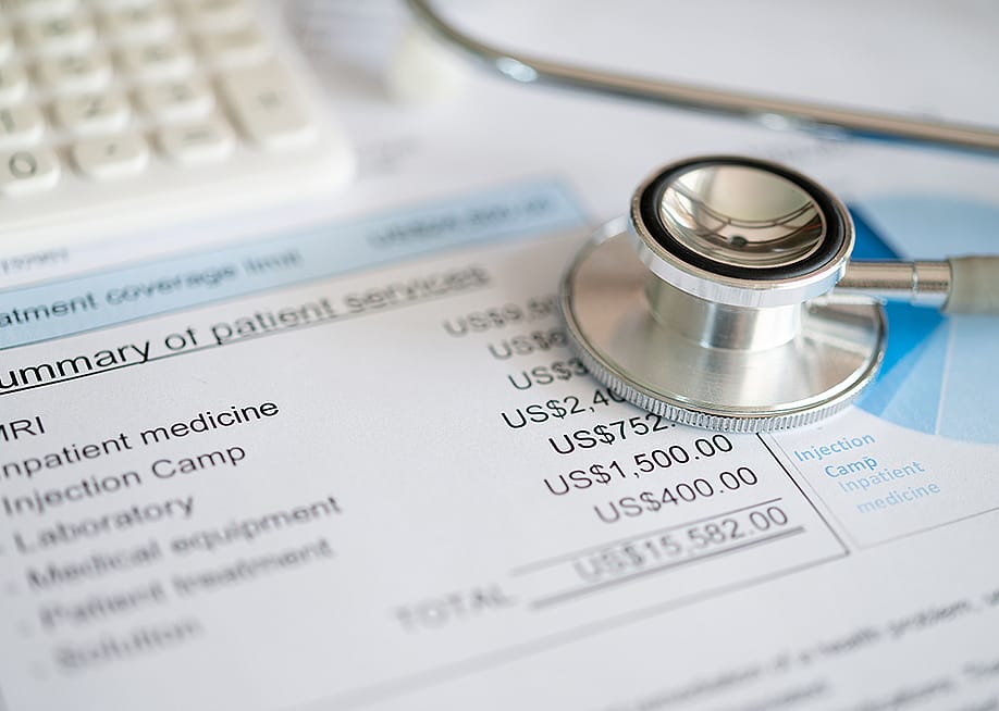 Stethoscope on top of medical expenses bill. — create jobs 51 // Shutterstock