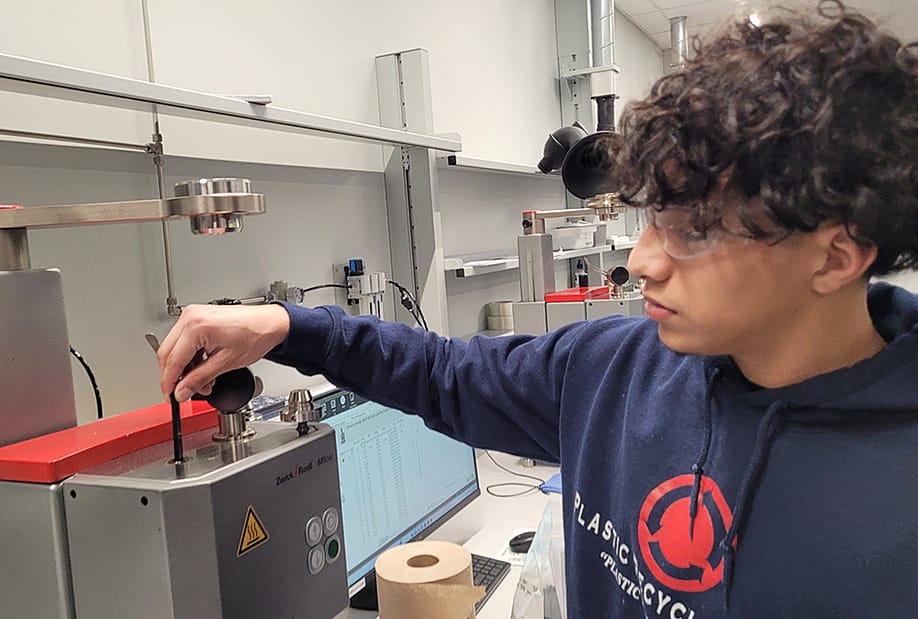 Indianapolis student Danny Bonila works as a lab technician at Plastic Recycling Inc. — Patrick O’Donnell for The 74