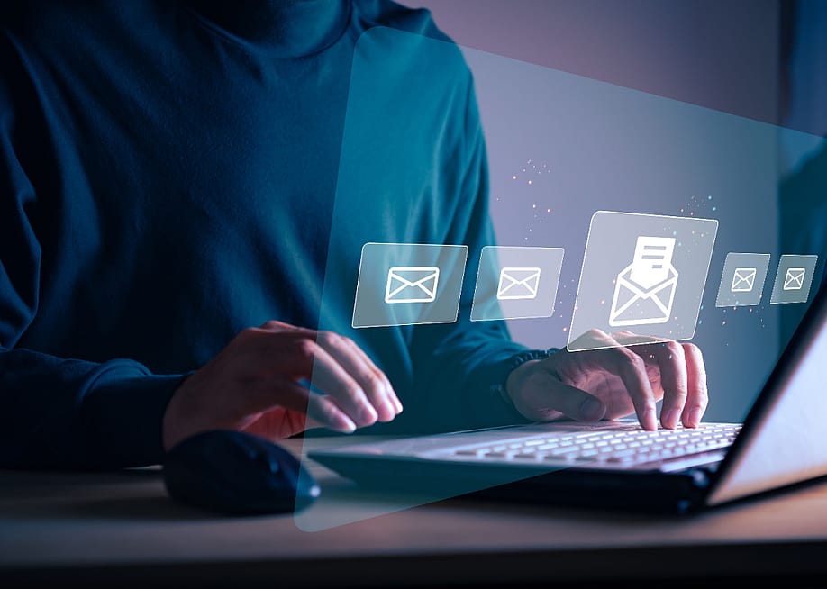 Businessman sending email to customer. — TeeStocker // Shutterstock