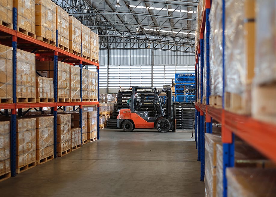 Interior of a modern auto parts factory or warehouse. — thanun vongsuravanich // Shutterstock