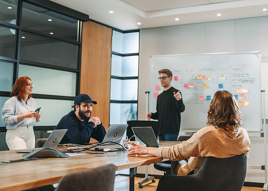 A startup business team having a meeting. — Jacob Lund // Shutterstock