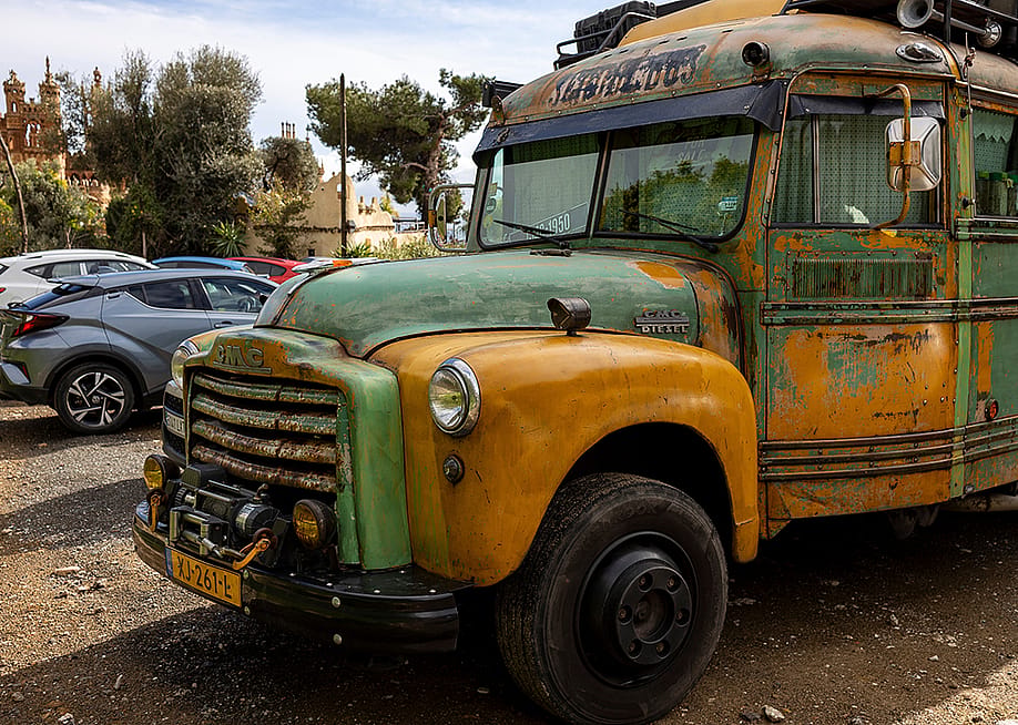 A vintage, old-timer school bus repurposed as a camper van. — Maarten Zeehandelaar // Shutterstock