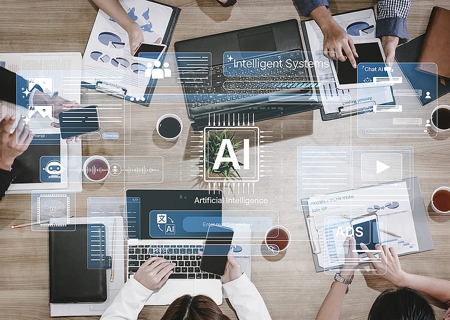 A business team meeting at a table illustrated with AI holographic effects. — Summit Art Creations // Shutterstock