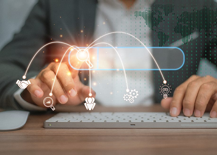 Person using a keyboard illustrated with data search technology graphics. — WUT.ANUNAI // Shutterstock