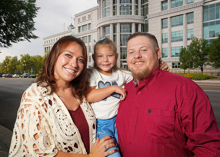 From left, Anyssa Zancanella, Azaylee Zancanella-McMicheal, and Danniel McMicheal stand in front of the Matheson Courthouse in Salt Lake City on Wednesday, Aug. 27, 2025. — Bethany Baker // The Salt Lake Tribune
