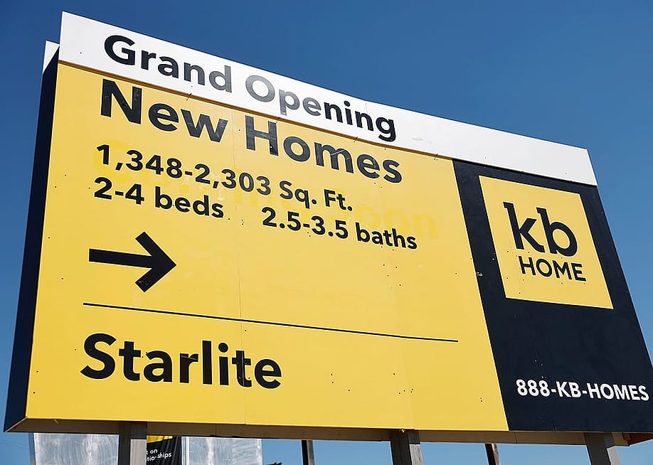 A "Grand Opening" of new homes signage is displayed at a new KB Home community in South El Monte, California. — Mario Tama // Getty Images