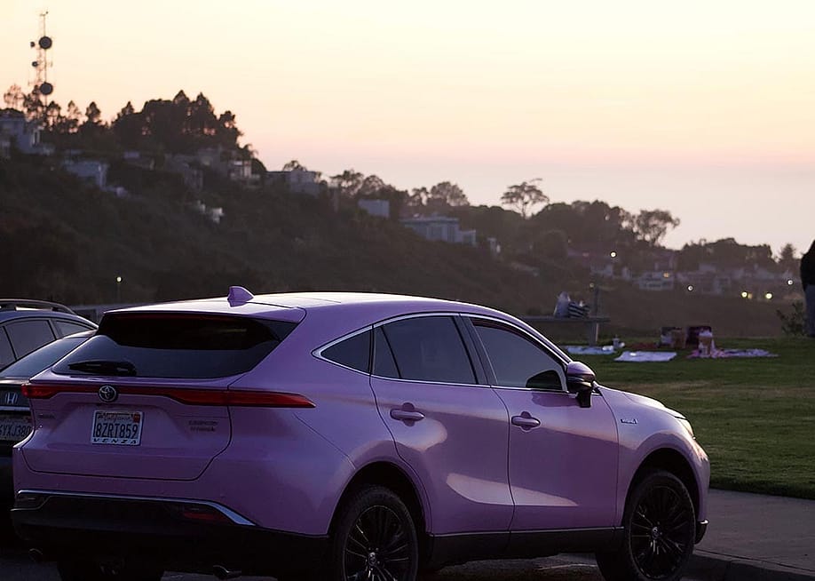 Pink toyota venza that looks lavender parked at mount soledad in san diego during sunset golden hour. — sarah_xie7 //Shutterstock