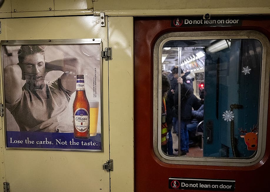 An beer brand ad displayed in a Holiday Nostalgia train in New York City. — Alexi Rosenfeld // Getty Images